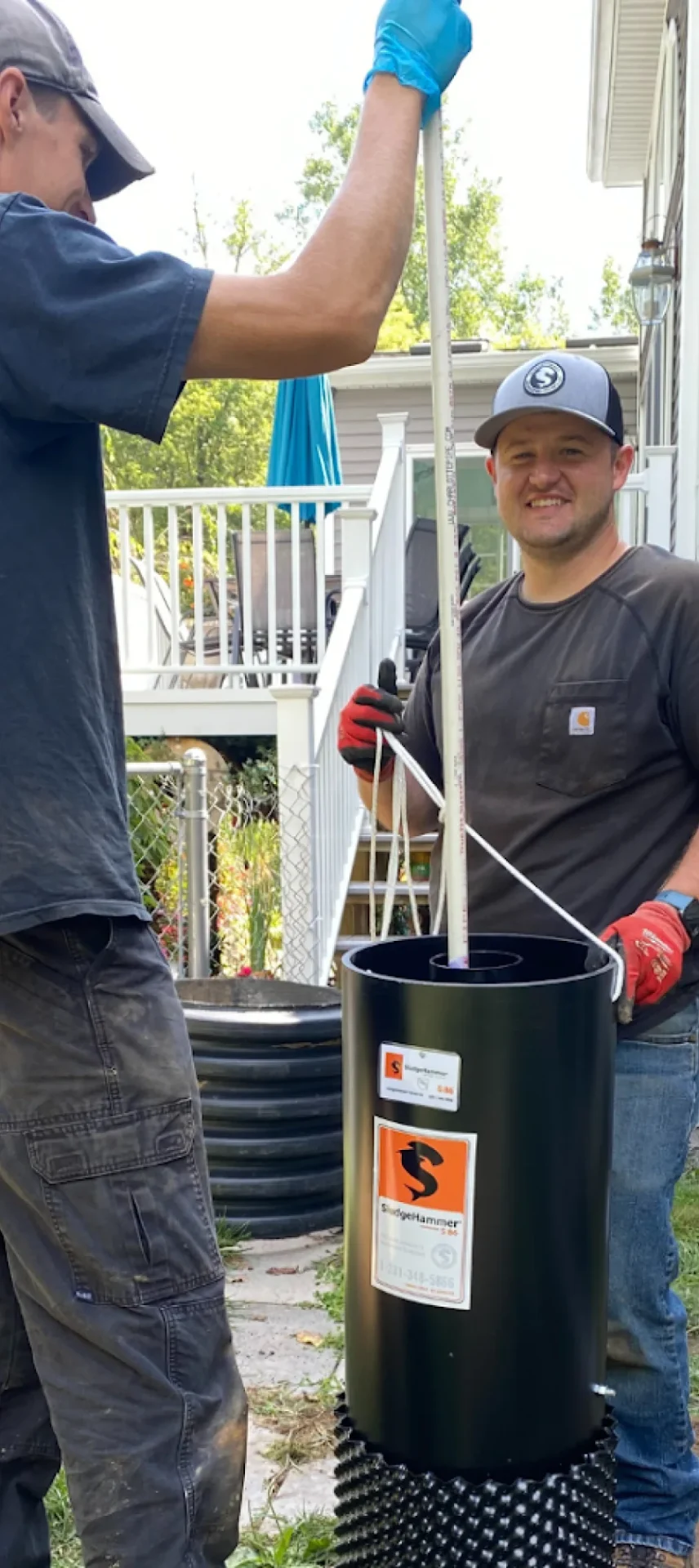 Man working sludgehammer scaled
