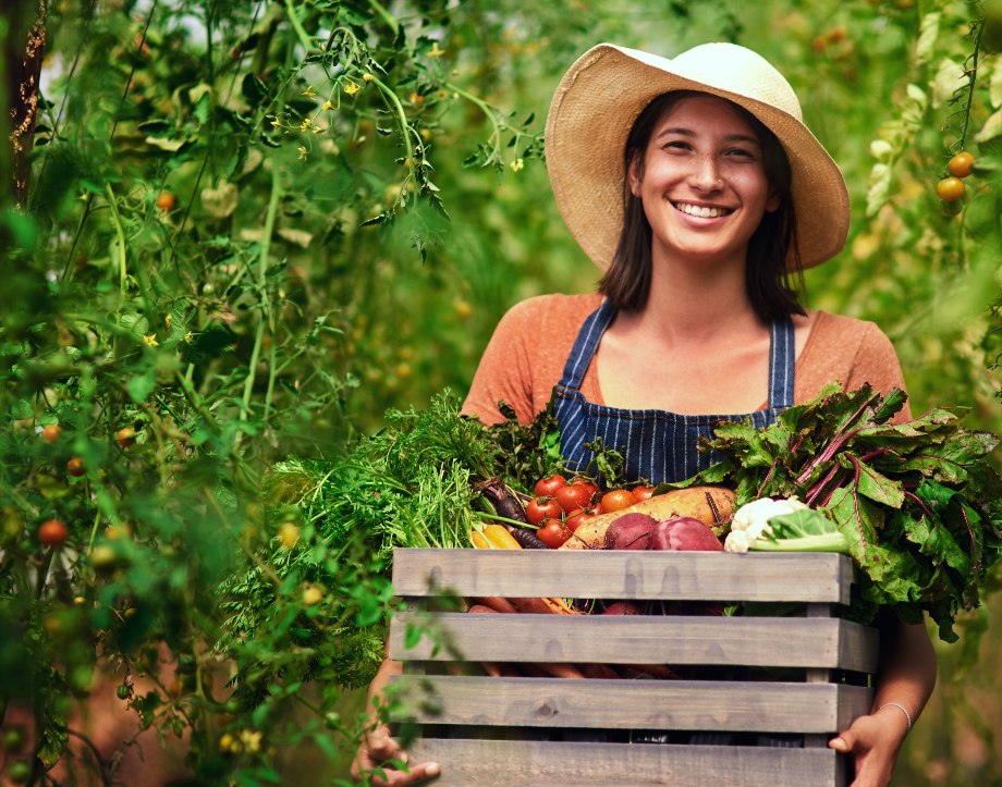 Girl smiling and picking fruits
