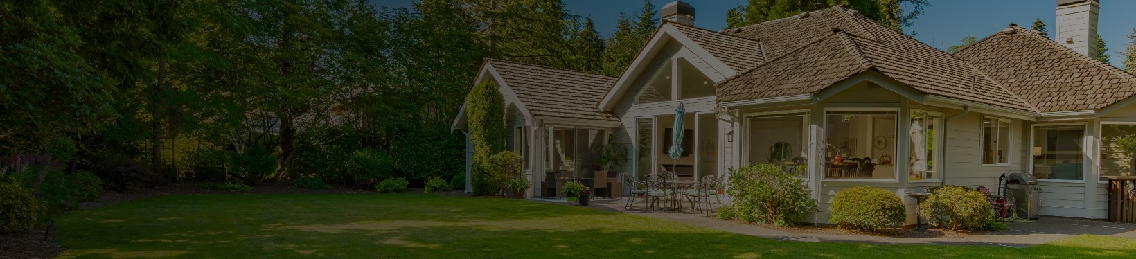 House with tree and grass outside