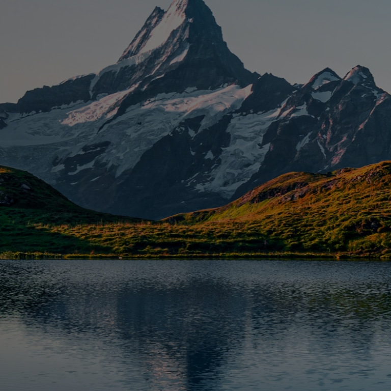 Landscape with mountains lake and sky