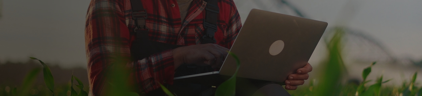Man using computer outside