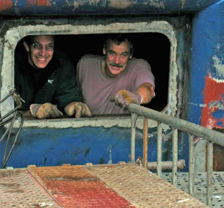 Men working pipes