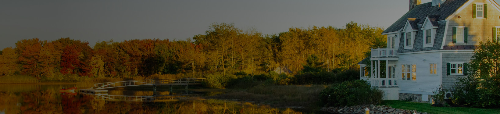White house in a lake during sunset