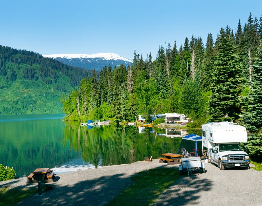Rv driving next to mountain