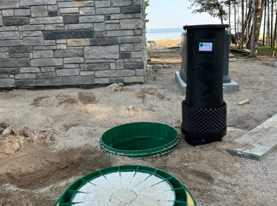 Sludge hammer product being displayed product next to home being installed